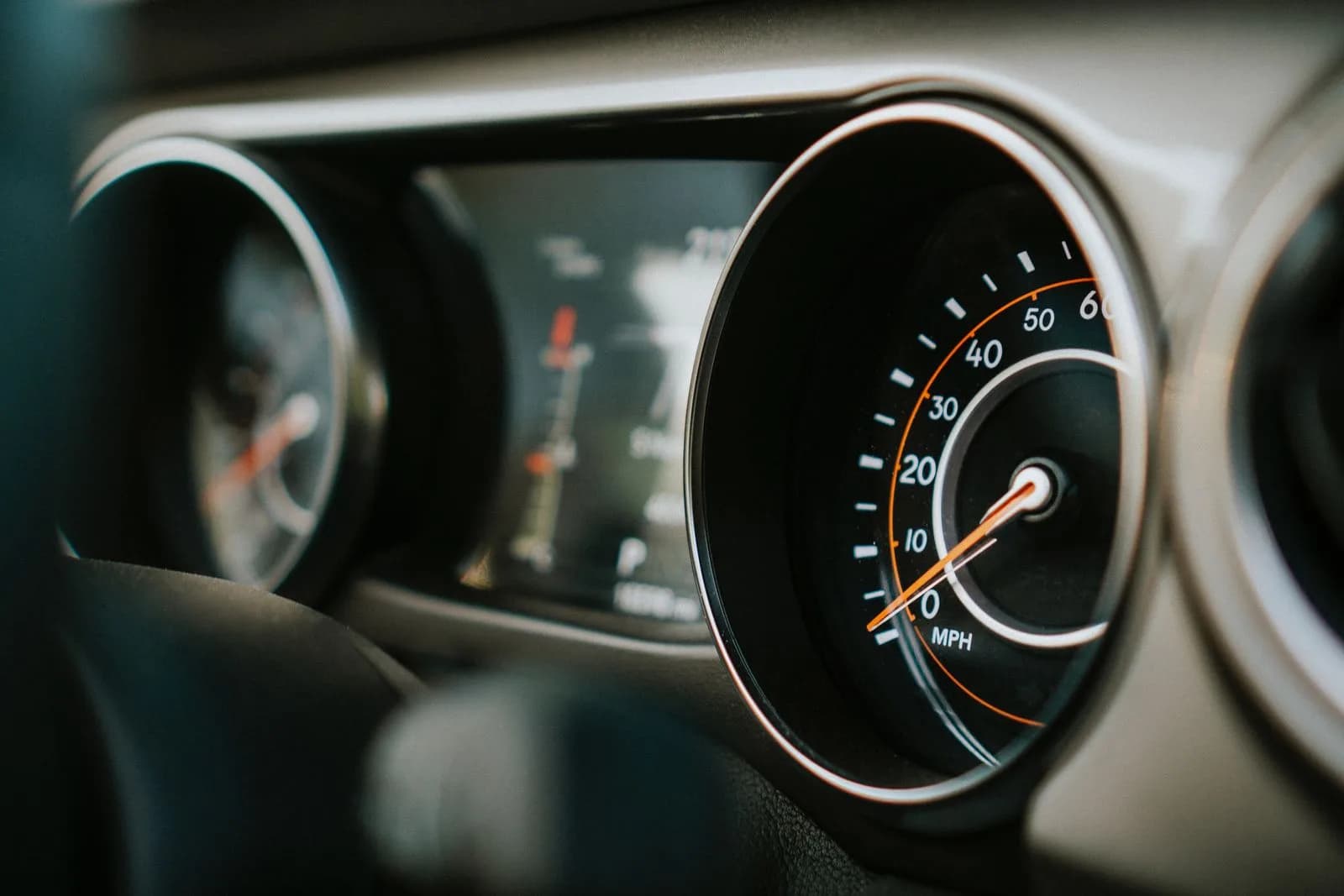 Close-up of a vehicle speedometer showing MPH