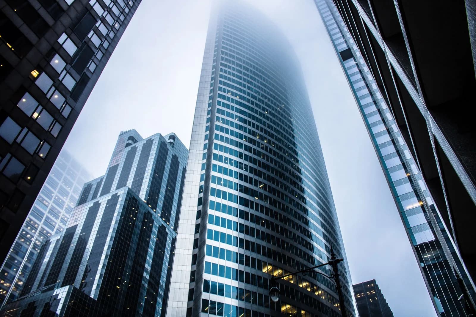 City skyscrapers viewed from below, representing the commercial fleets High Point GPS supports