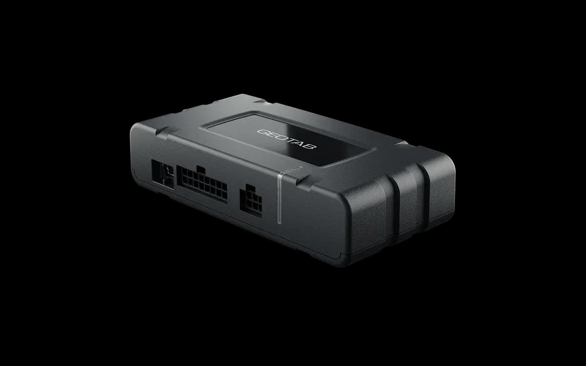 The GO10 GPS tracking device, a compact black telematics unit, on a white background