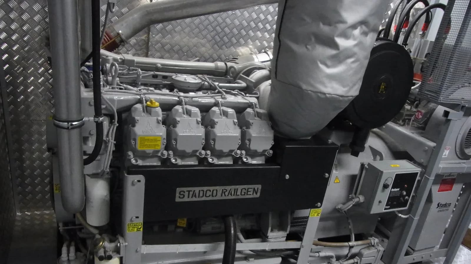 A standby diesel generator set on a concrete pad
