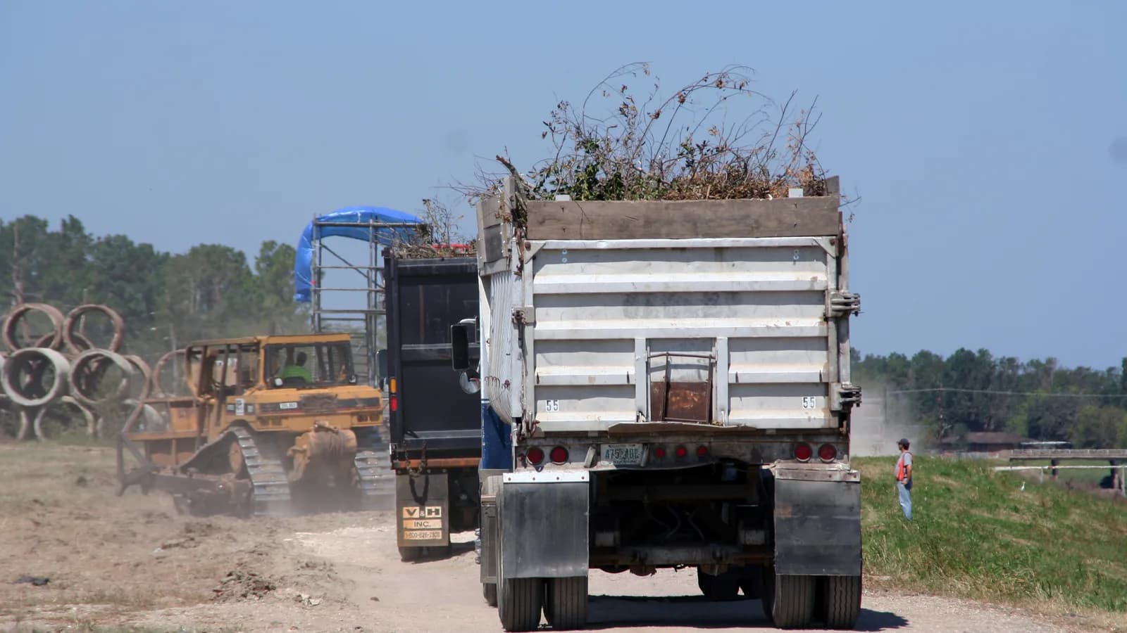 A dump truck loaded with construction debris