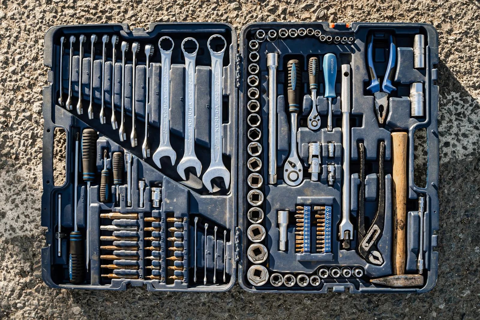 An organized toolbox with a variety of hand tools